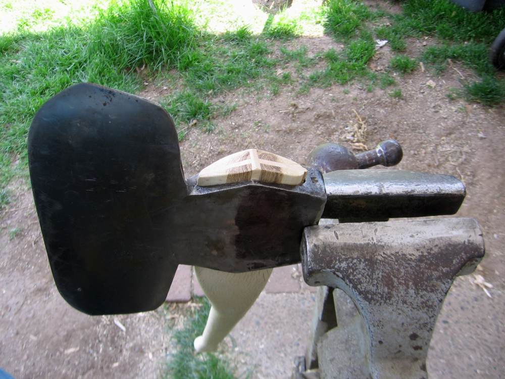 Remove an axe head and reuse the handle